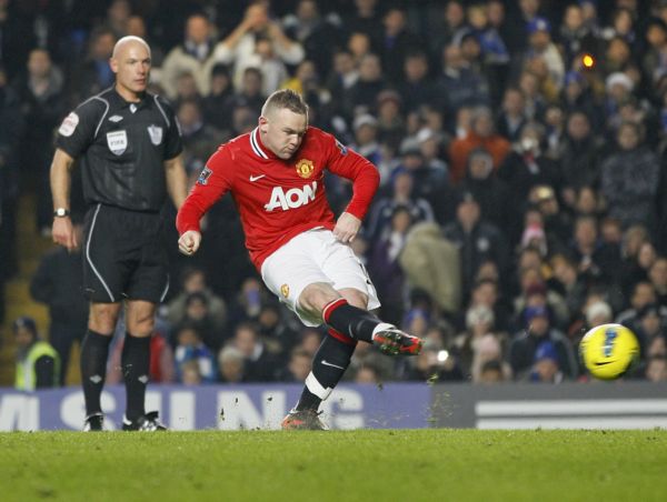 Wayne Rooney a penalty.